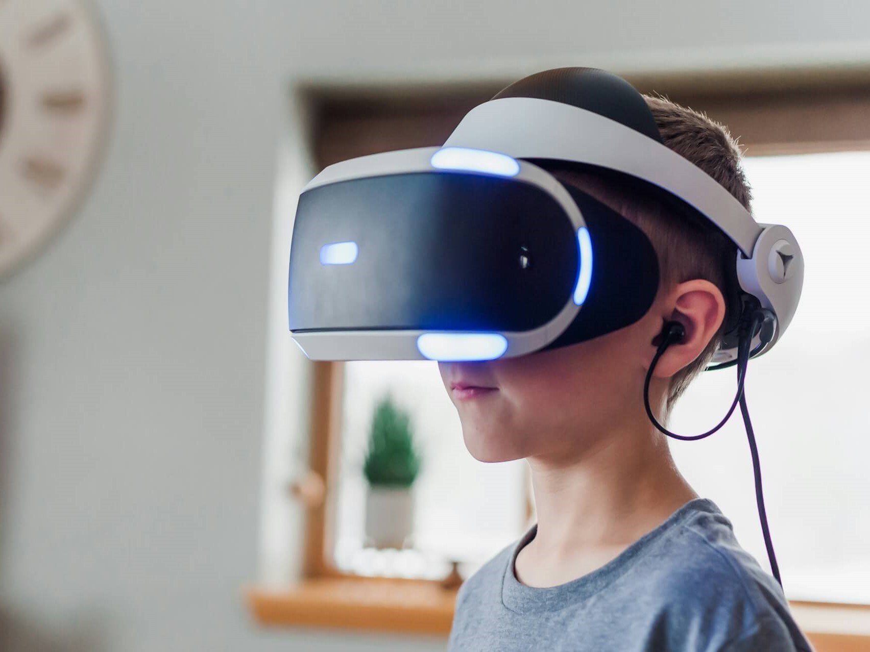 A kid using a VR device